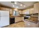 Well-equipped kitchen with light wood cabinets at 15050 N Thompson Peak Pkwy # 1059, Scottsdale, AZ 85260