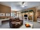 Living room with leather sofa and built-in shelving at 15050 N Thompson Peak Pkwy # 1059, Scottsdale, AZ 85260