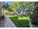 Landscaped pathway through a lush green lawn at 15050 N Thompson Peak Pkwy # 1059, Scottsdale, AZ 85260