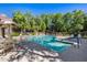 Community swimming pool with surrounding patio furniture at 15050 N Thompson Peak Pkwy # 1059, Scottsdale, AZ 85260