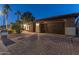 Attractive single-story home with a brick driveway and two-car garage at 16169 W Fairmount Ave, Goodyear, AZ 85395