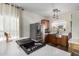 Modern kitchen with stainless steel appliances and quartz countertops at 16173 W Monroe St, Goodyear, AZ 85338