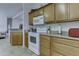 Bright kitchen features ample cabinetry and modern appliances at 17200 W Bell Rd # 2255, Surprise, AZ 85374