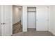 Spacious bedroom closet with sliding doors and hanging rod at 18363 W Smoketree Dr, Wittmann, AZ 85361