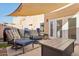 Private backyard patio with seating and fire pit at 1920 E Maryland Ave # 21, Phoenix, AZ 85016