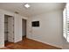 Well-lit bedroom with wood floors and ample closet space at 20704 N 90Th Pl # 1008, Scottsdale, AZ 85255