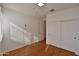 Light and airy bedroom featuring wood floors and built-in closet at 20704 N 90Th Pl # 1008, Scottsdale, AZ 85255