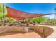 Community playground with shade structure and play equipment at 20704 N 90Th Pl # 1008, Scottsdale, AZ 85255