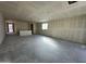 Open concept living room with kitchen island at 22852 E Lords Way, Queen Creek, AZ 85142