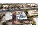 Aerial view of a house with solar panels and a backyard at 25417 S Kansas Ave, Sun Lakes, AZ 85248