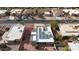 Aerial view of the house, highlighting its solar panels and neighborhood setting at 25417 S Kansas Ave, Sun Lakes, AZ 85248