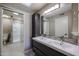 Modern bathroom with double vanity and shower at 25417 S Kansas Ave, Sun Lakes, AZ 85248