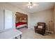 Bedroom with sitting area and view into Primary bedroom at 25417 S Kansas Ave, Sun Lakes, AZ 85248