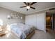 Bright bedroom featuring a comfy bed and ample closet space at 25417 S Kansas Ave, Sun Lakes, AZ 85248