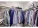 Well-organized closet with clothing and shelves at 25417 S Kansas Ave, Sun Lakes, AZ 85248