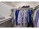 Well-organized closet with clothing and shelves at 25417 S Kansas Ave, Sun Lakes, AZ 85248