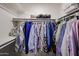 Well-organized closet with clothing and shelves at 25417 S Kansas Ave, Sun Lakes, AZ 85248