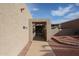 Covered walkway leading to the house entrance with stone flooring at 25417 S Kansas Ave, Sun Lakes, AZ 85248