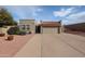 Single story home with a tile roof and a two-car garage at 25417 S Kansas Ave, Sun Lakes, AZ 85248