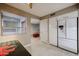 Bright kitchen features white appliances and wood-look flooring at 25417 S Kansas Ave, Sun Lakes, AZ 85248