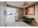 White kitchen with a breakfast bar and tile flooring at 25417 S Kansas Ave, Sun Lakes, AZ 85248