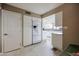 Modern kitchen with white cabinets, quartz countertops, and tile backsplash at 25417 S Kansas Ave, Sun Lakes, AZ 85248