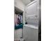 Stackable washer and dryer in a laundry closet at 25417 S Kansas Ave, Sun Lakes, AZ 85248