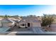 Single-story home with a two-car garage and front yard at 25583 W Beth Dr, Buckeye, AZ 85326