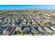 Aerial view of a suburban neighborhood with houses and mountain backdrop at 25583 W Beth Dr, Buckeye, AZ 85326