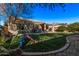 Large backyard with grassy area, playset, and hot tub at 25583 W Beth Dr, Buckeye, AZ 85326