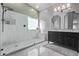 Elegant bathroom with a walk-in shower and double vanity at 25583 W Beth Dr, Buckeye, AZ 85326