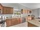 Well-equipped kitchen featuring ample cabinetry and granite countertops at 25583 W Beth Dr, Buckeye, AZ 85326