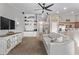 Bright living room with built-in shelving and comfortable seating at 25583 W Beth Dr, Buckeye, AZ 85326