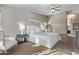 Main bedroom featuring a king-size bed and updated decor at 25583 W Beth Dr, Buckeye, AZ 85326