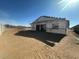 Rear view of a new home under construction with scaffolding at 2674 E Abe Truckle Ave, San Tan Valley, AZ 85140