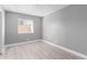 Simple bedroom with gray walls and window with blinds at 2847 N 46Th Ave # 8, Phoenix, AZ 85035