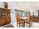 Bright dining area featuring a wood table and chairs, and built-in hutch at 3034 N Ricardo --, Mesa, AZ 85215