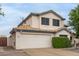 Two-story house with desert landscaping and a two-car garage at 3034 N Ricardo --, Mesa, AZ 85215