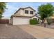 Two-story house with desert landscaping and a two-car garage at 3034 N Ricardo --, Mesa, AZ 85215