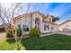 Two-story house with a landscaped lawn, attached garage, and neutral color scheme at 3124 N Sage Cir, Avondale, AZ 85392