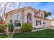 Two-story house with a landscaped lawn, attached garage, and neutral color scheme at 3124 N Sage Cir, Avondale, AZ 85392