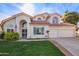 Two-story house with a landscaped lawn, attached garage, and neutral color scheme at 3124 N Sage Cir, Avondale, AZ 85392