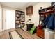 Bright entryway with built-in shelving, hardwood floors, and coat rack at 3213 N 41St Pl, Phoenix, AZ 85018