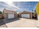 Two-car garage with attached workshop space and extra storage at 3213 N 41St Pl, Phoenix, AZ 85018