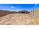 Large backyard with block wall and space for landscaping at 3317 N 300Th Dr, Buckeye, AZ 85396