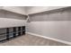 Spacious walk-in closet with built-in shelving and hanging rods at 3317 N 300Th Dr, Buckeye, AZ 85396