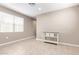 Light-filled living room featuring tile floors at 3317 N 300Th Dr, Buckeye, AZ 85396