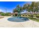 Community water feature with unique sculpture at 3317 N 300Th Dr, Buckeye, AZ 85396