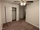 Spacious bedroom with carpeted floor and closet at 3480 E Sheffield Rd, Gilbert, AZ 85296