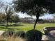 Landscaped community park with grassy areas and trees at 3480 E Sheffield Rd, Gilbert, AZ 85296